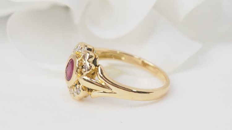 Yellow gold, ruby and diamond daisy ring