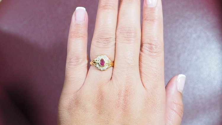 Yellow gold, ruby and diamond daisy ring