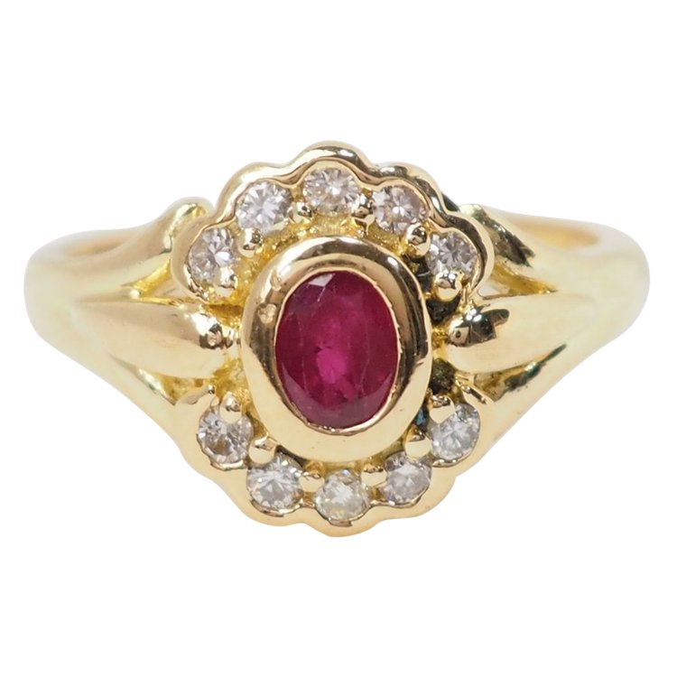 Yellow gold, ruby and diamond daisy ring