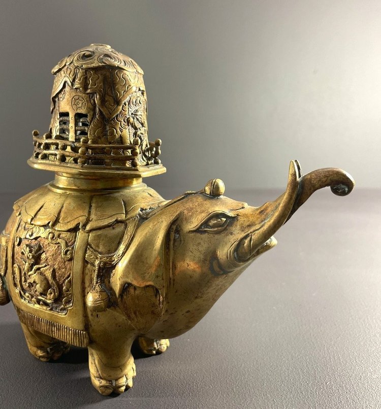 China, First Third of the 20th Century, Bronze Incense Burner with Gilded Patina Depicting an Elephant.