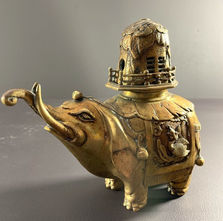 China, First Third of the 20th Century, Bronze Incense Burner with Gilded Patina Depicting an Elephant.