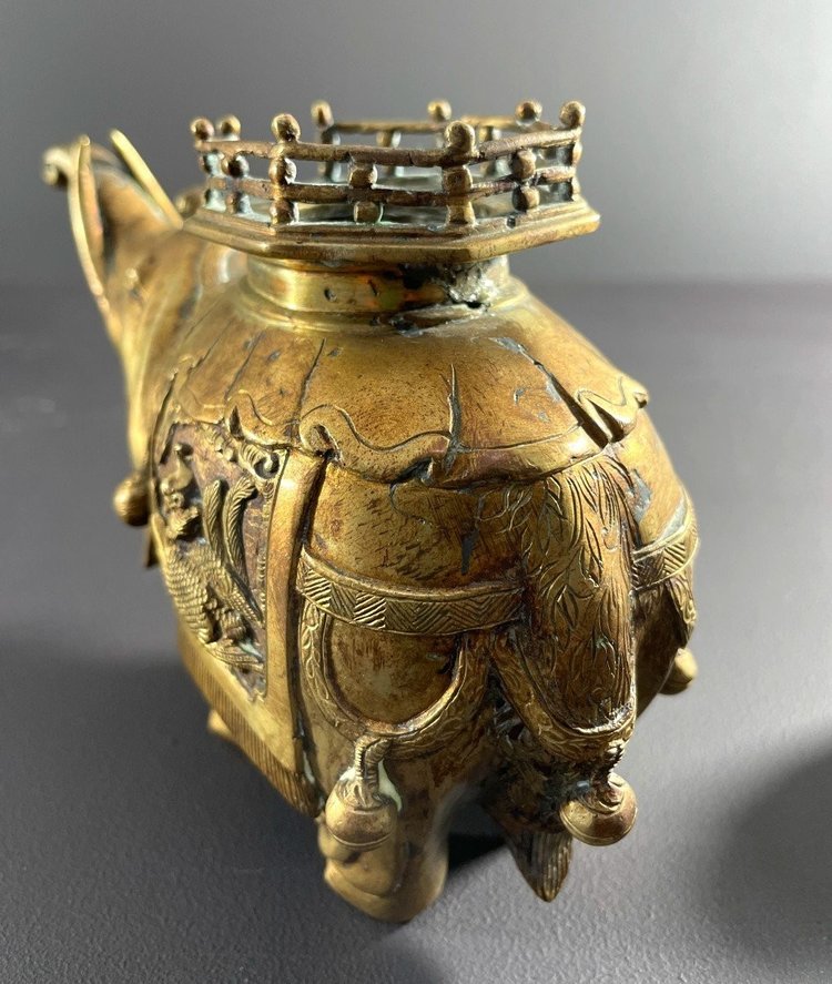 China, First Third of the 20th Century, Bronze Incense Burner with Gilded Patina Depicting an Elephant.