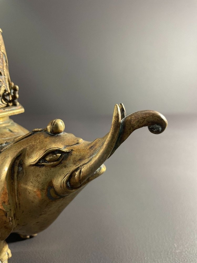 China, First Third of the 20th Century, Bronze Incense Burner with Gilded Patina Depicting an Elephant.