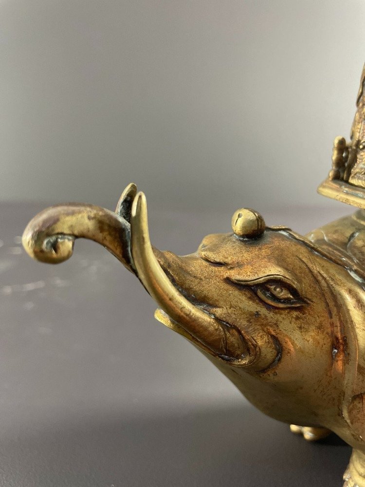 China, First Third of the 20th Century, Bronze Incense Burner with Gilded Patina Depicting an Elephant.