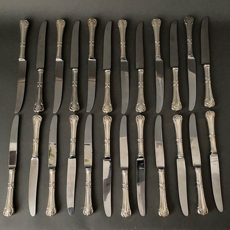 Suite of 24 Mexican silver knives, Louis XV style, early 20th century