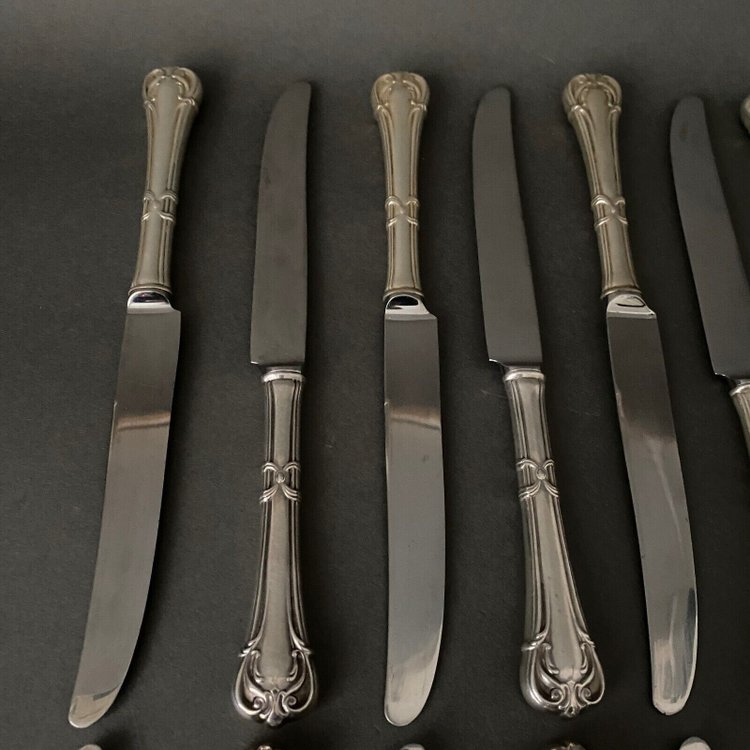 Suite of 24 Mexican silver knives, Louis XV style, early 20th century