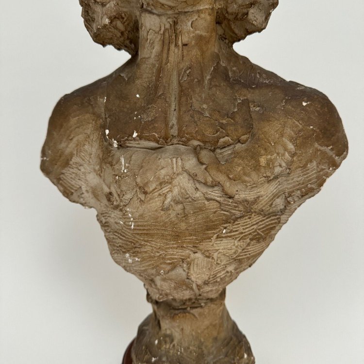 Bust in patinated plaster from the Charles Filleul workshop, 20th century, representing a man