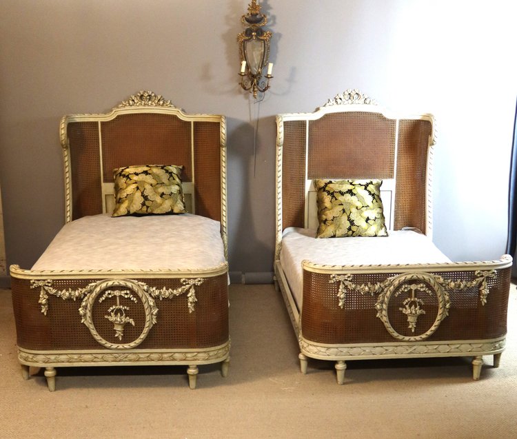 Pair of Louis XVI style caned beds