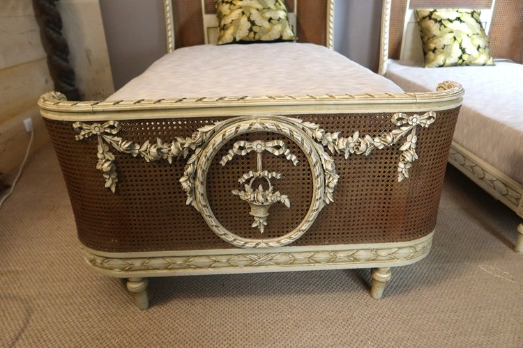 Pair of Louis XVI style caned beds