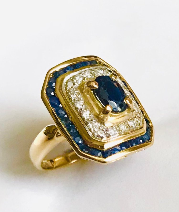 Gold cocktail ring with sapphires and diamonds