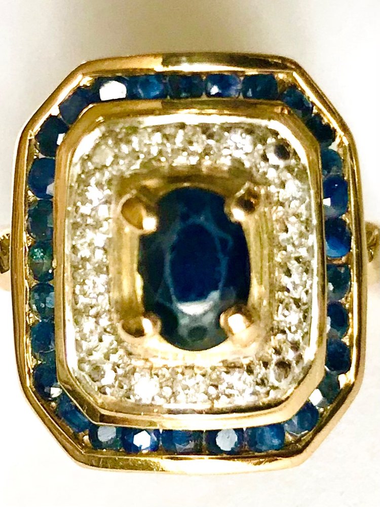 Gold cocktail ring with sapphires and diamonds