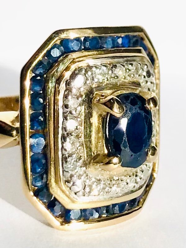 Gold cocktail ring with sapphires and diamonds