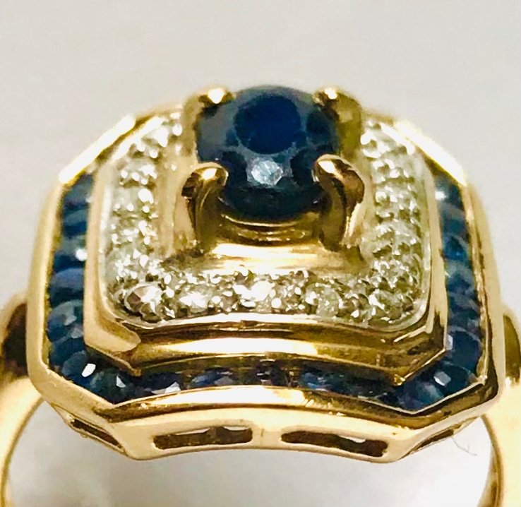 Gold cocktail ring with sapphires and diamonds