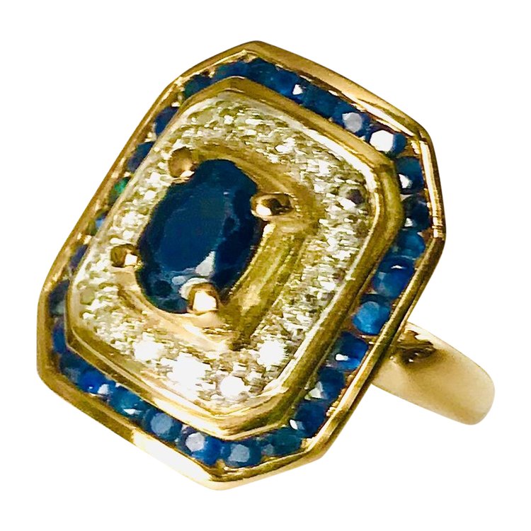 Gold cocktail ring with sapphires and diamonds