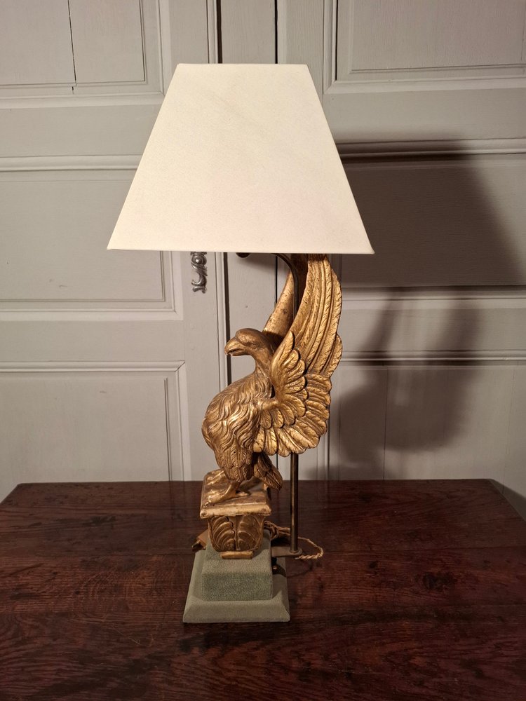 Lampe aigle en bois doré d’époque XIXème siècle.