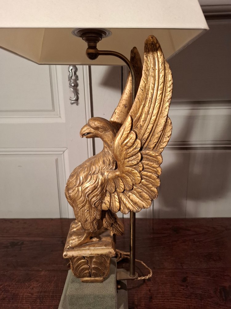 Lampe aigle en bois doré d’époque XIXème siècle.