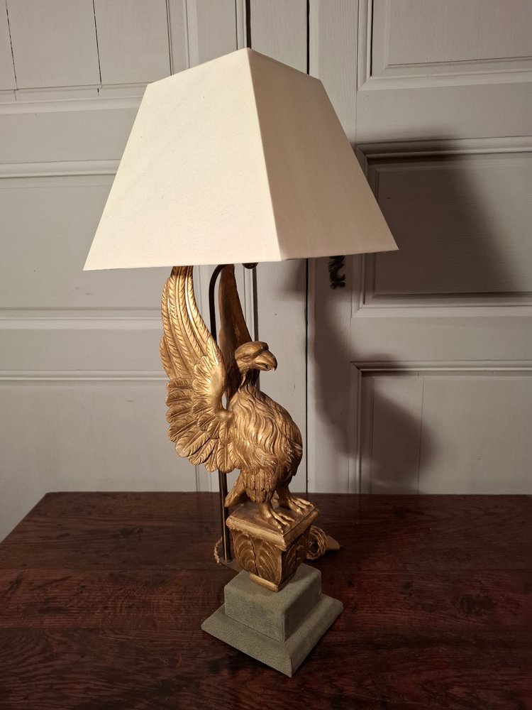 Lampe aigle en bois doré d’époque XIXème siècle.