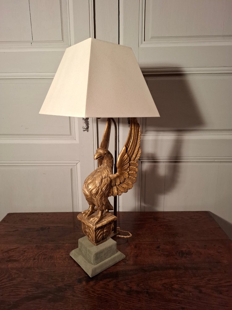 Lampe aigle en bois doré d’époque XIXème siècle.