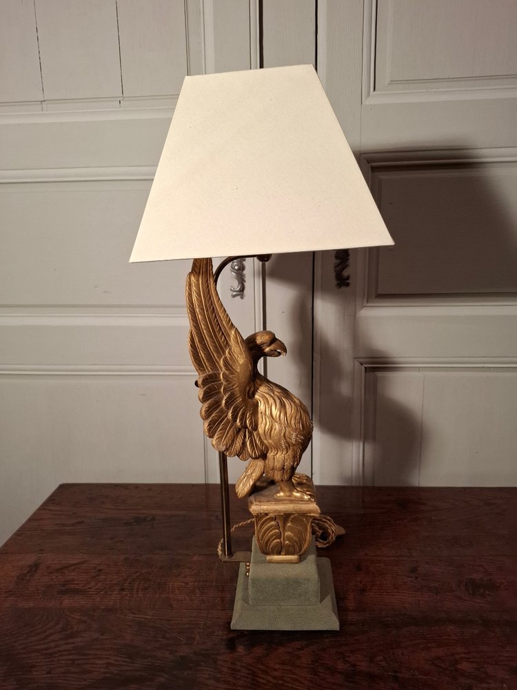 Lampe aigle en bois doré d’époque XIXème siècle.