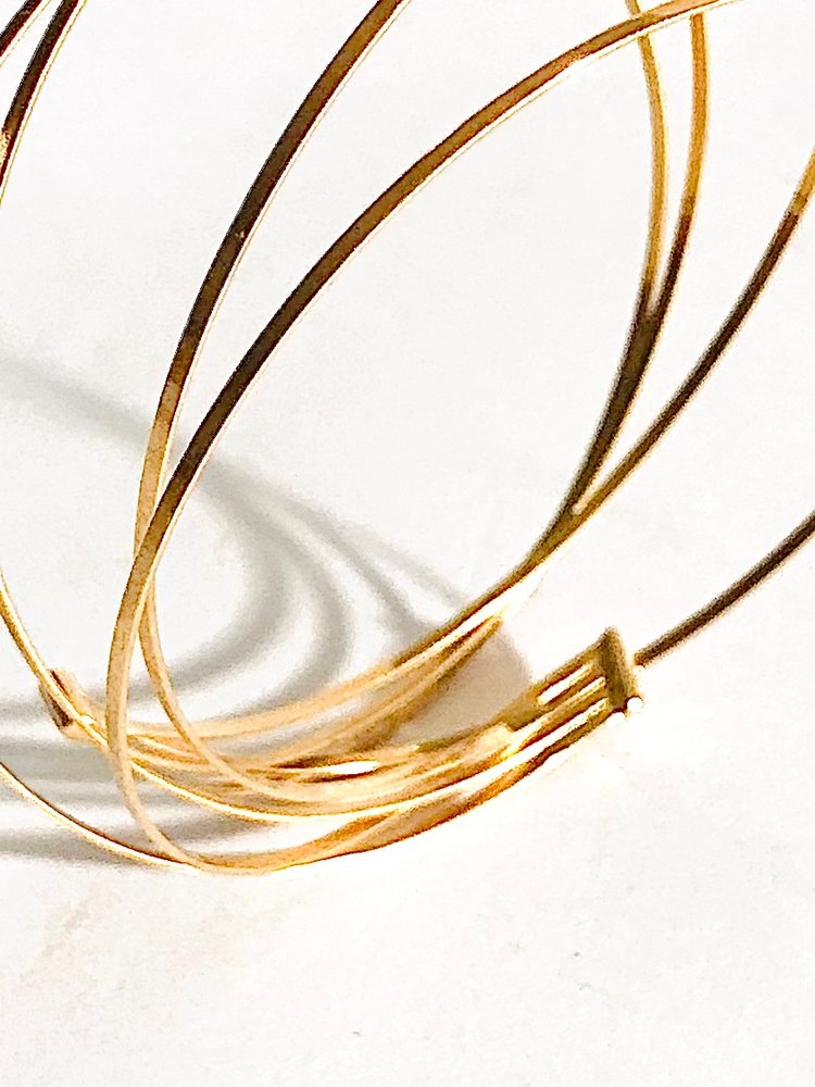 Semi-rigid multi-bangle bracelet in 18k gold