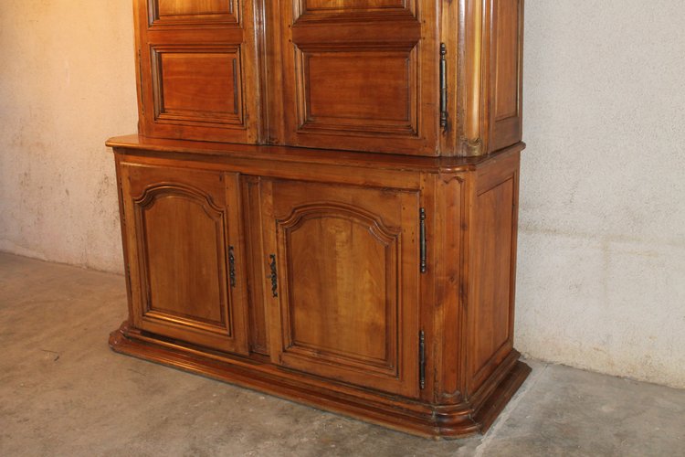 Two-part sideboard in fruitwood paneling, Louis XIV period, early 18th century. Origin: Ile de France.