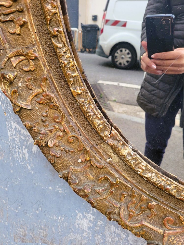 Large Oval Mirror in Carved and Gilded Oak, Louis XVI Period, 18th Century