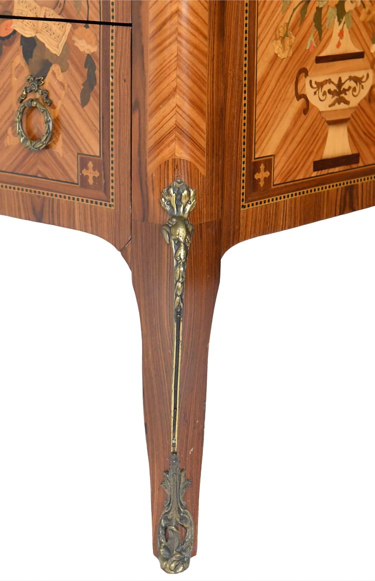 Transition style chest of drawers in marquetry with trophy decoration of musical instruments