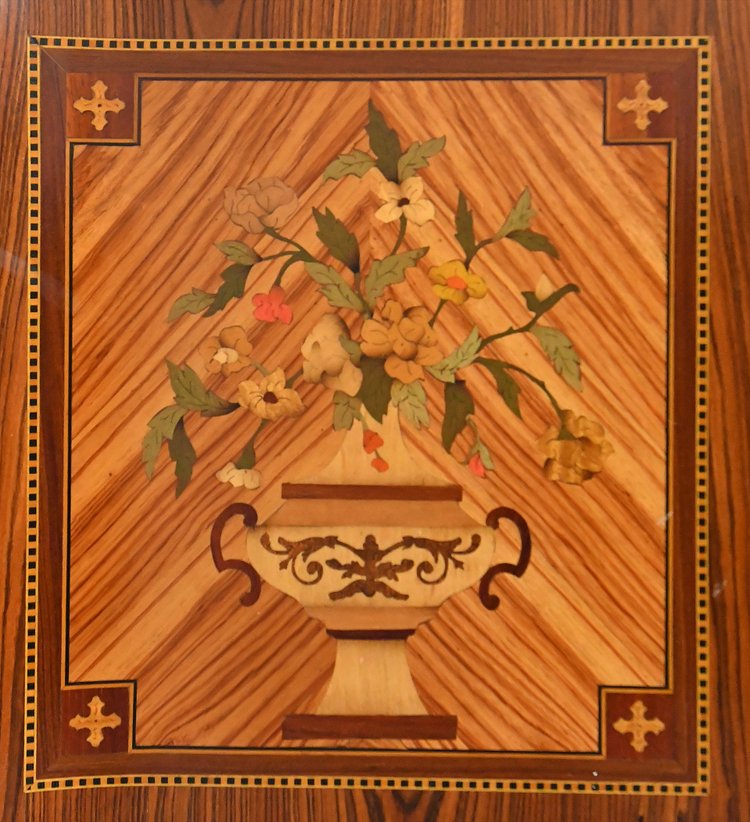 Transition style chest of drawers in marquetry with trophy decoration of musical instruments