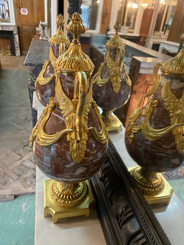 Pair of Louis XVI style cassolettes, Napoleon III period, in marble and gilded bronze