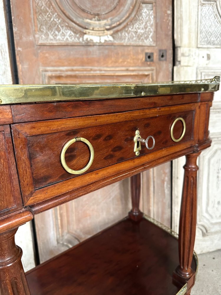 Louis XVI-style console in speckled mahogany