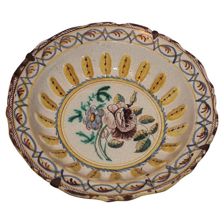 Nevers earthenware salad bowl, floral design with strong gadroons, early 18th century