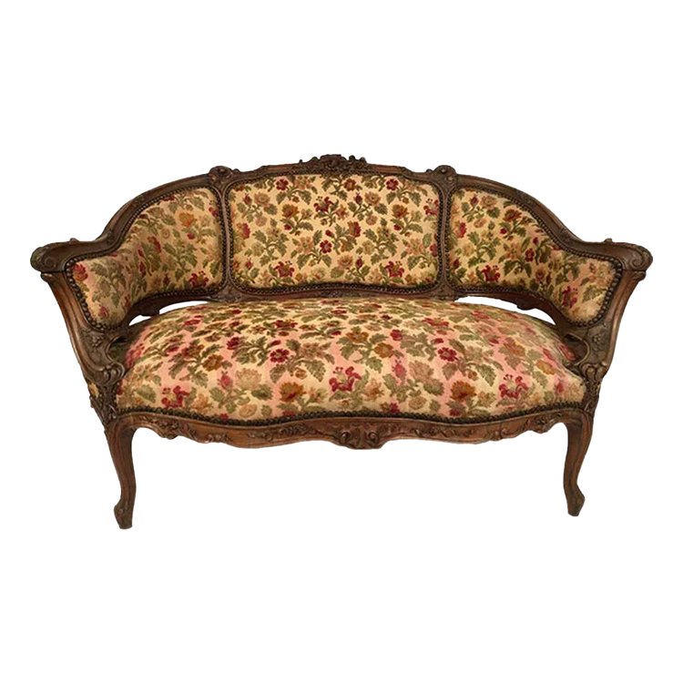 Small Rocaille-style sofa in richly carved walnut, 19th century