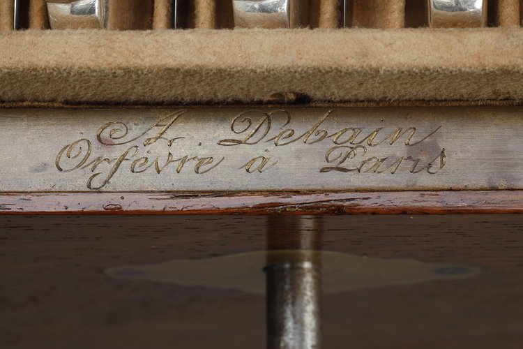 FLATWARE SILVER IN AN OAK CASE BY ALFONSE DEBAIN GOLDSMITH IN PARIS