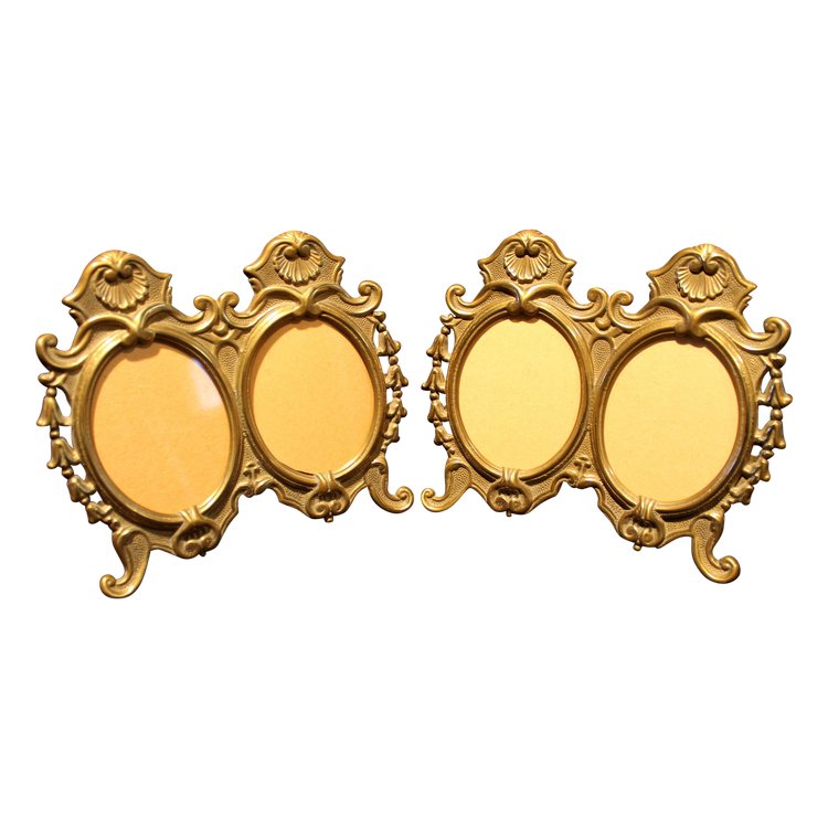 Pair of oval bronze and brass frames in the Louis XV style 20th century