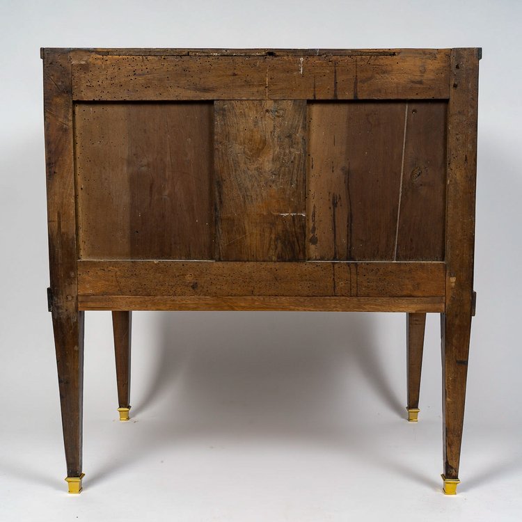 A commode Sauteuse with musical instruments marquetry, Louis XVI period circa 1780