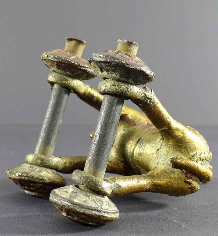 India, Early 20th Century, Bronze Cornac toy perched on an elephant.