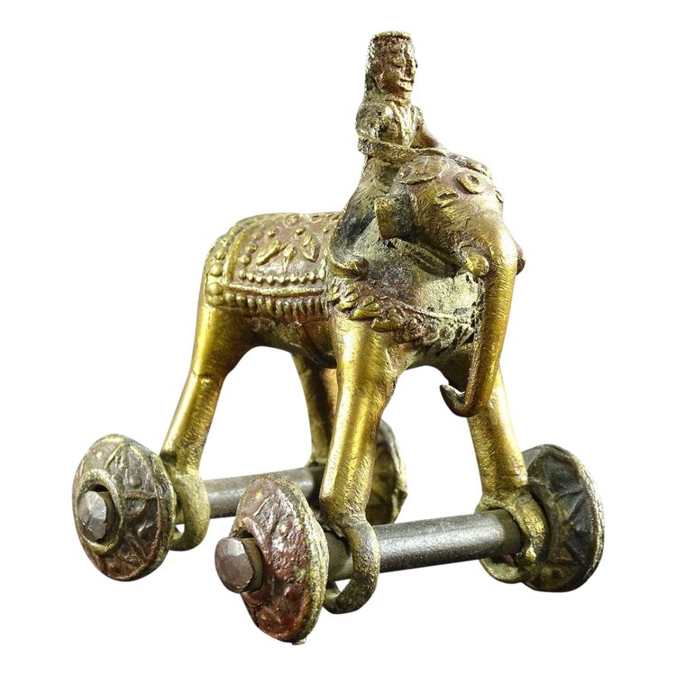 India, Early 20th Century, Bronze Cornac toy perched on an elephant.