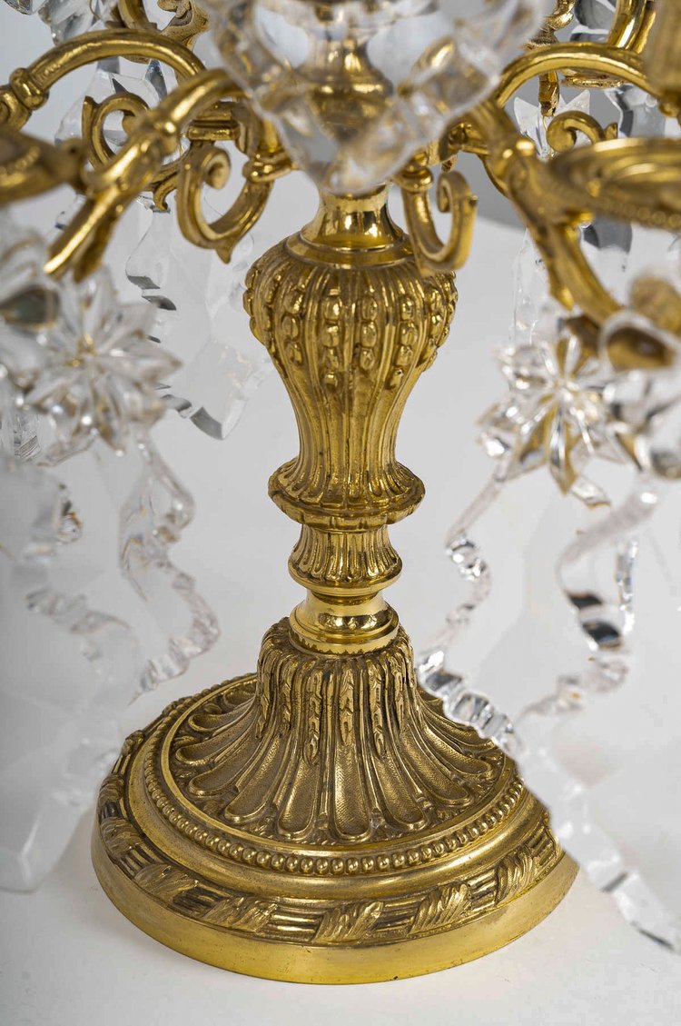 Coppia di girandole in bronzo dorato e cristallo Baccarat in stile Luigi XVI, 1870 ca.