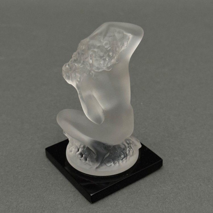 Nude female subject by Lalique in frosted glass on black base