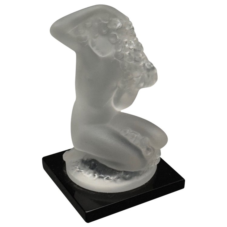 Nude female subject by Lalique in frosted glass on black base