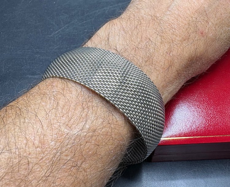 EUROPEAN SILVER-PLATED BRAIDED BANGLE BRACELET FROM THE 1980S