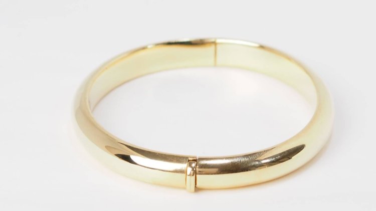 Bracciale bangle traforato in oro giallo