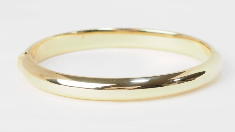 Bracciale bangle traforato in oro giallo