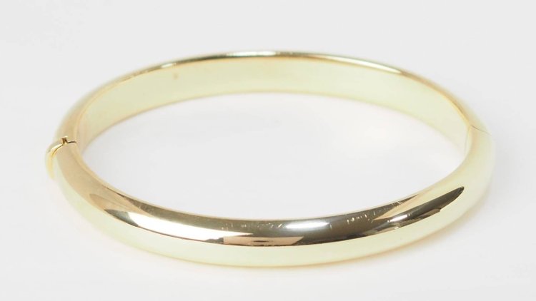 Bracciale bangle traforato in oro giallo