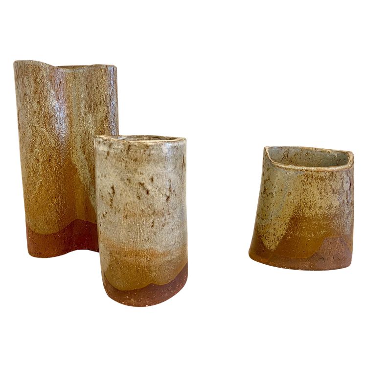 Ensemble de 3 vases en terre cuite émaillée.