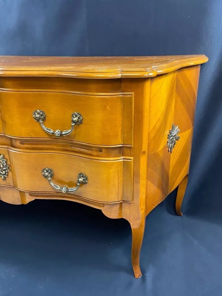 Large Louis XV-style bronze cherrywood commode with crossbow profile