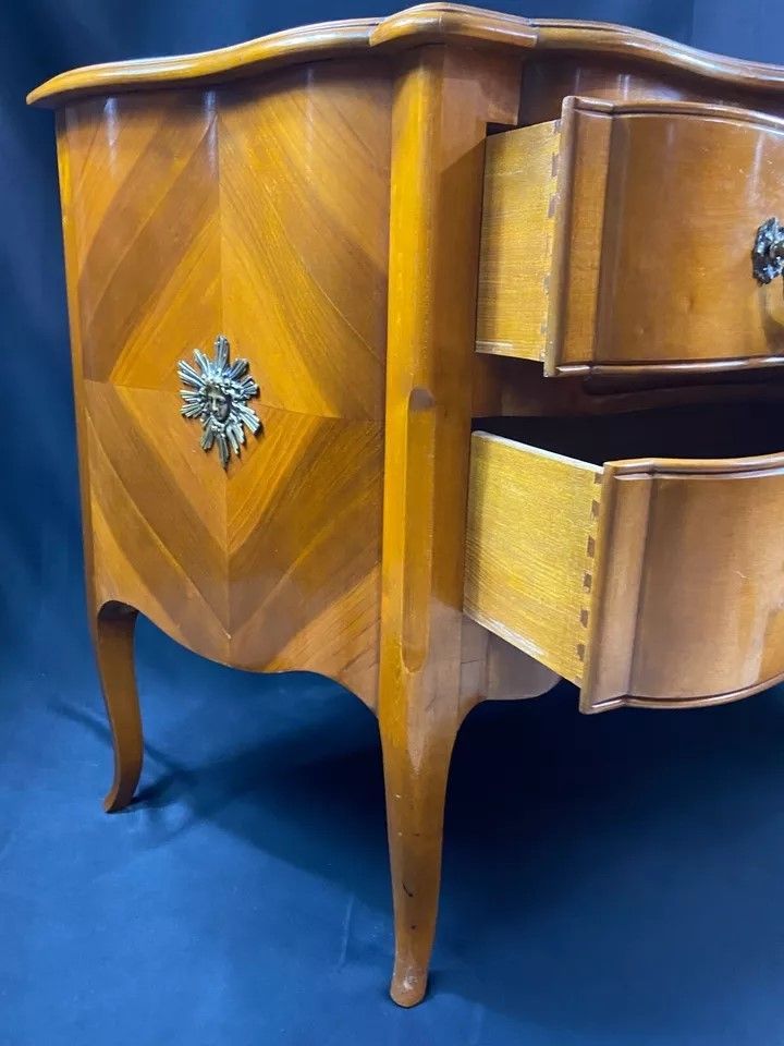 Large Louis XV-style bronze cherrywood commode with crossbow profile