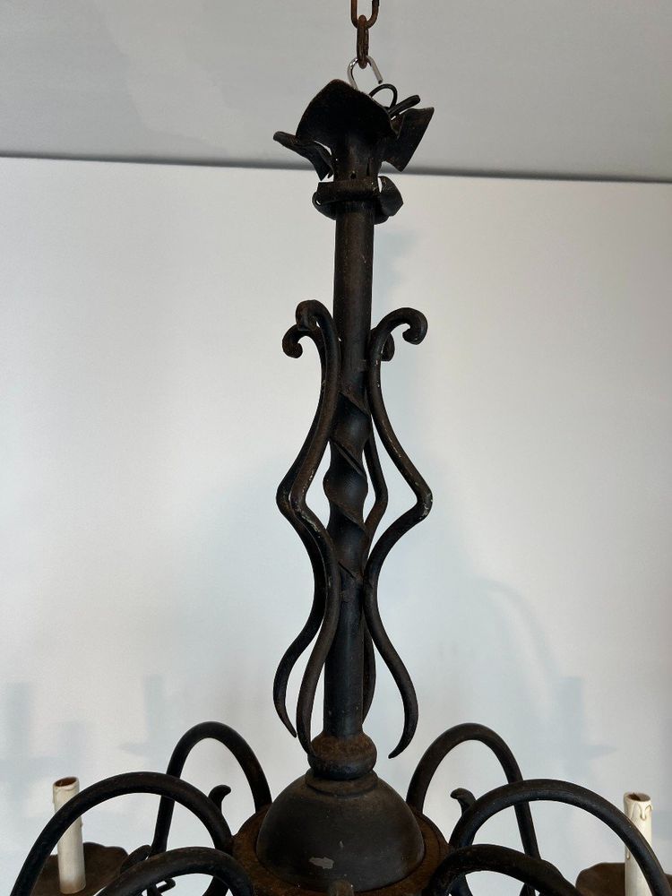 Important 8-Arm Wrought Iron Chandelier. French work. Circa 1940