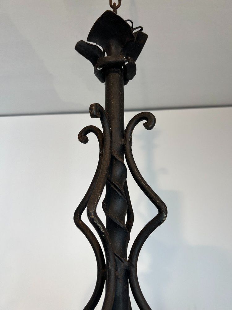 Important 8-Arm Wrought Iron Chandelier. French work. Circa 1940