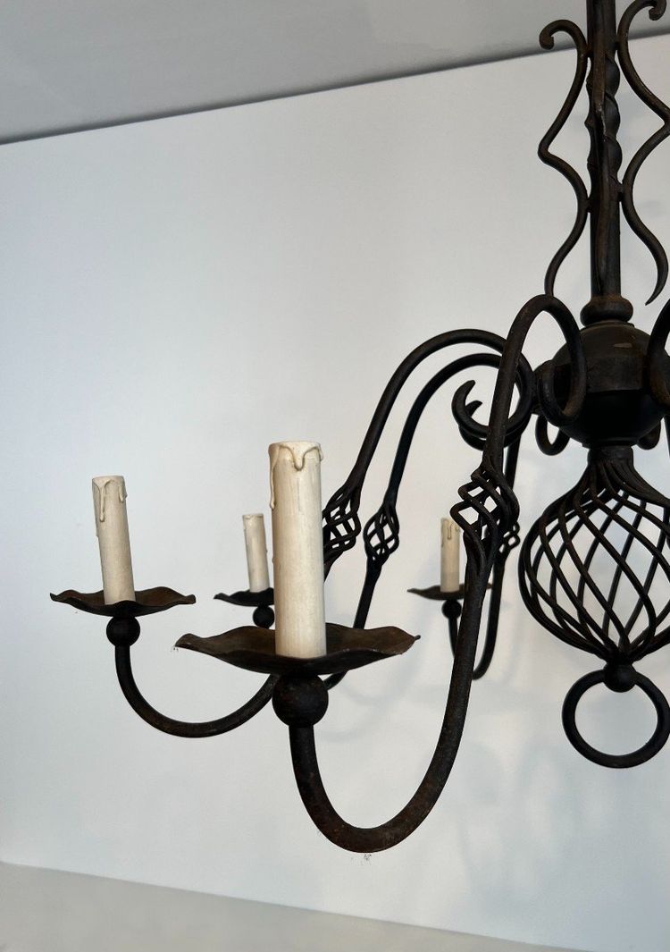 Important 8-Arm Wrought Iron Chandelier. French work. Circa 1940